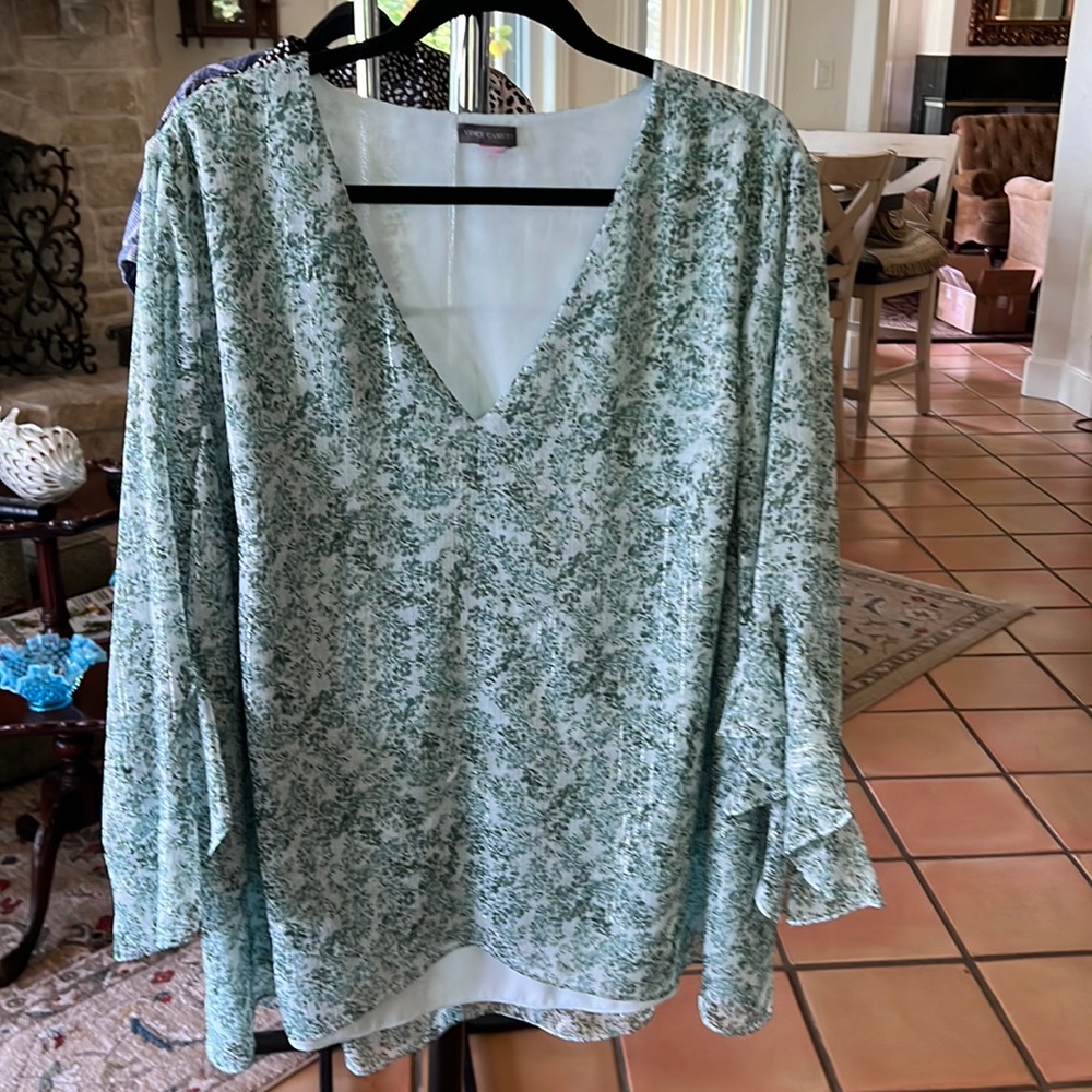 Lovely blouse. Beautiful color.